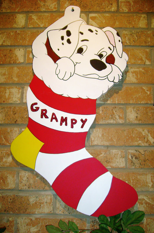 Dalmatian Puppy in Grampy Christmas Stocking made by Art de Yard